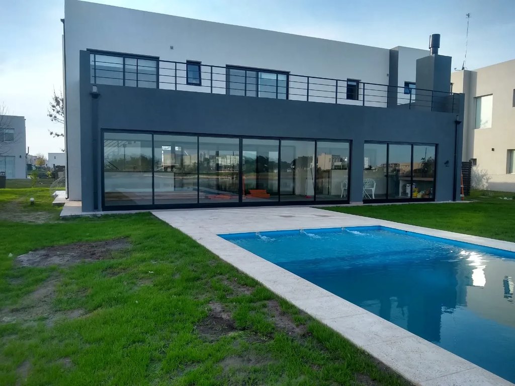 Cerramiento para terraza con aluminio y vidrio de Plus Metal